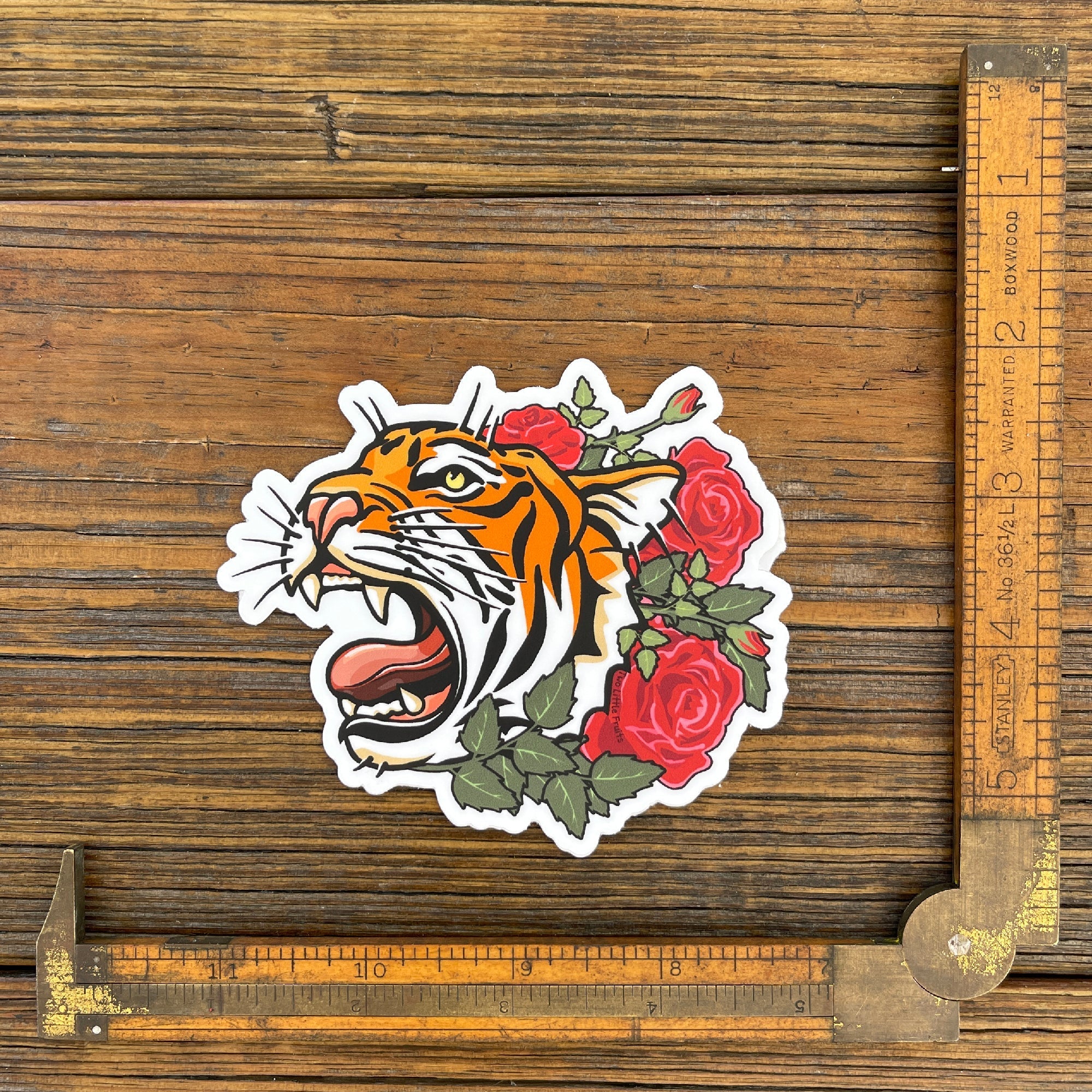 Close-up of Tiger Sticker with a measuring ruler, showcasing the detailed tattoo-inspired design of a tiger amidst red roses.