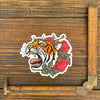 Close-up of Tiger Sticker with a measuring ruler, showcasing the detailed tattoo-inspired design of a tiger amidst red roses.