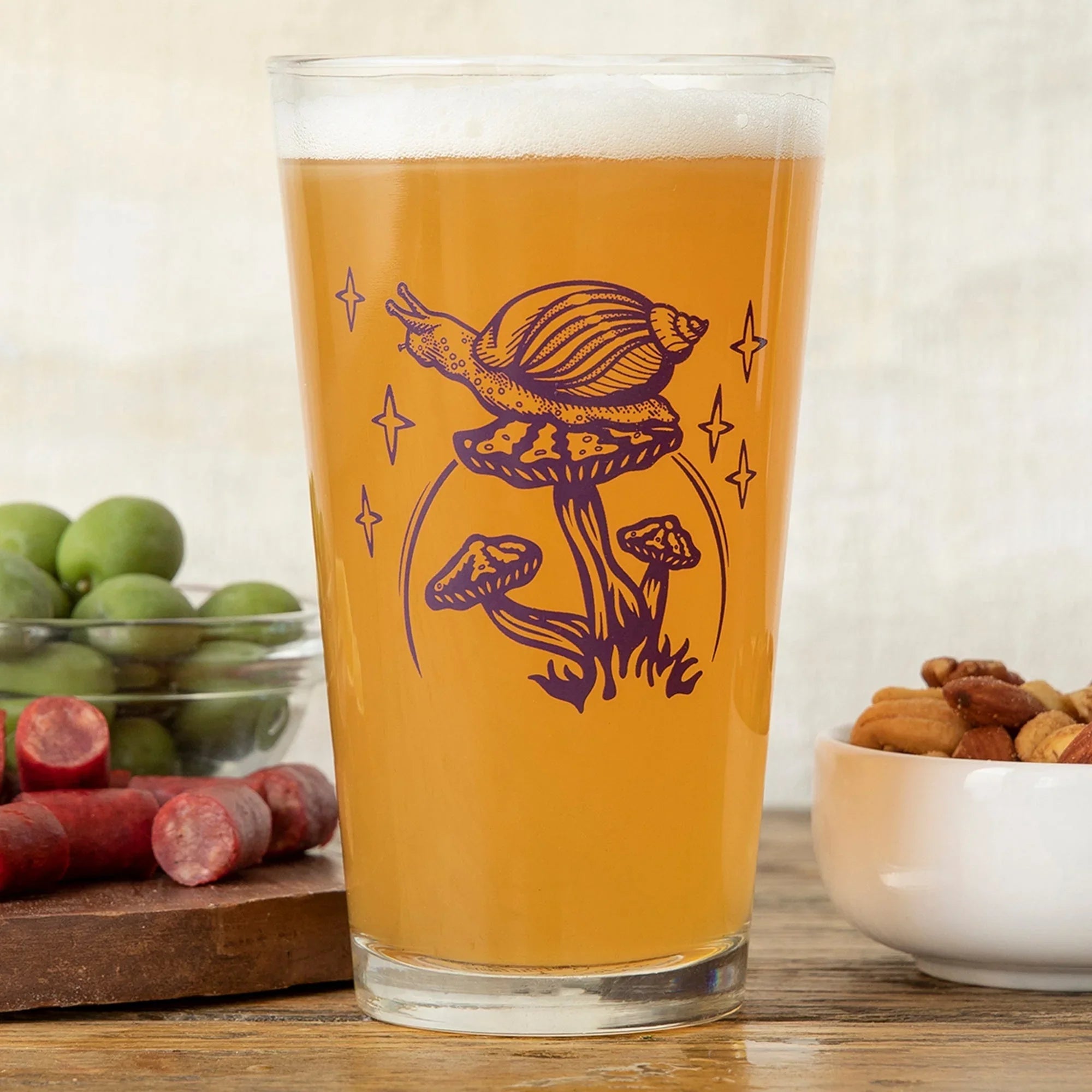 Mushroom illustrated pint glass by Two Little Fruits